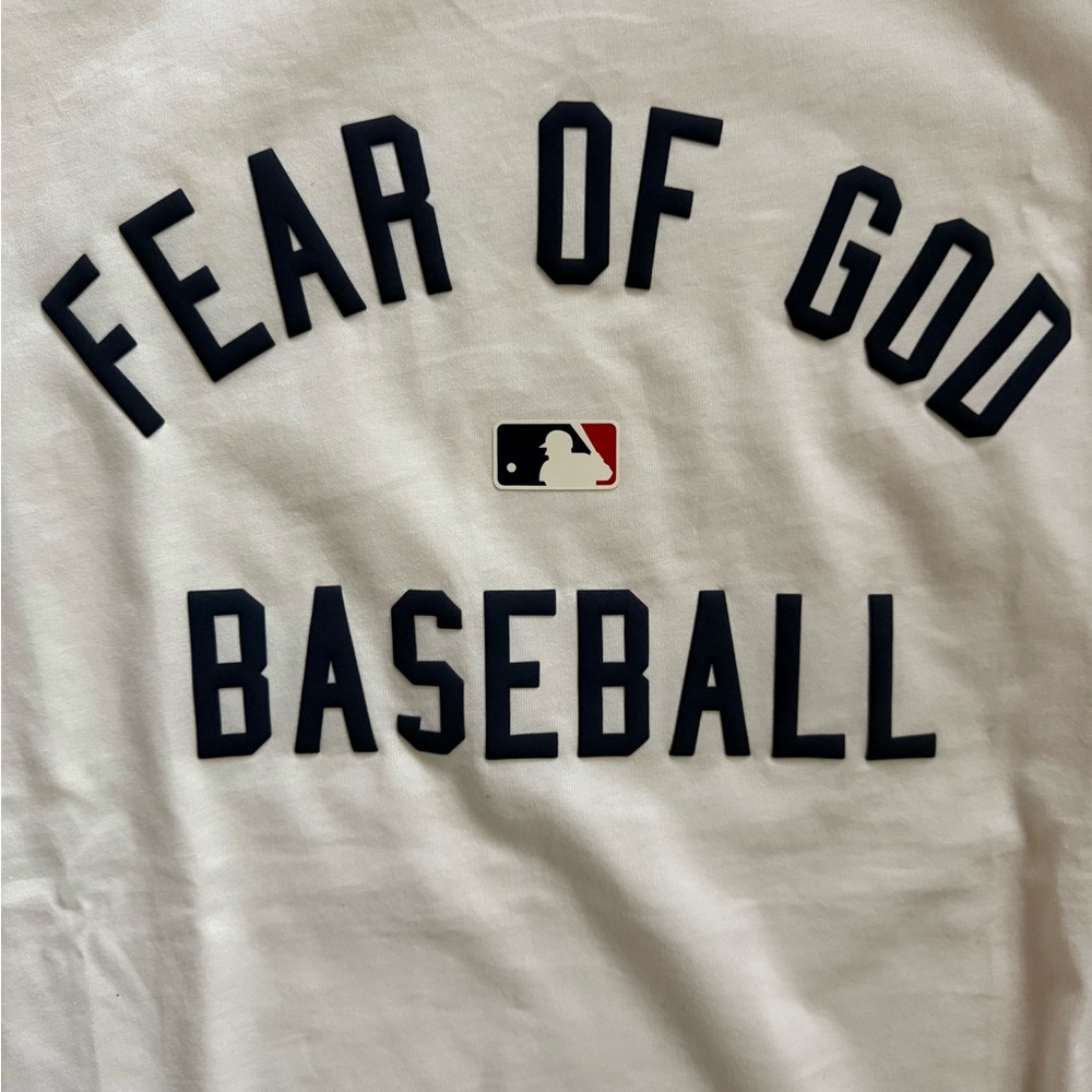 Fear of God Genuine Merch Tag in Cream